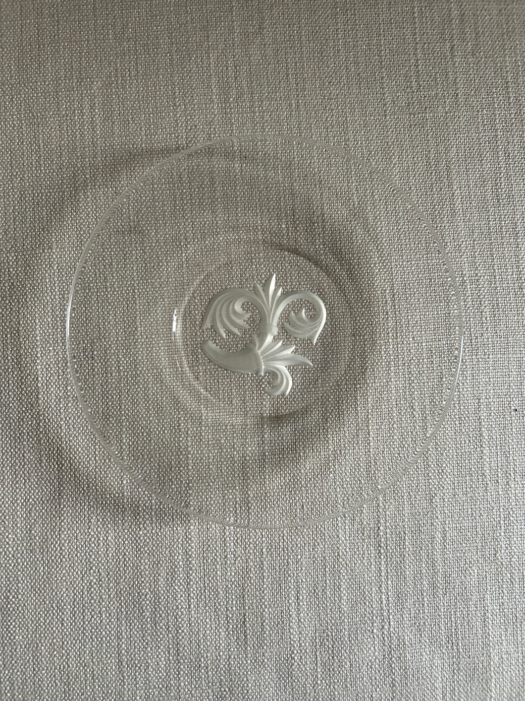 Glass plate, etched